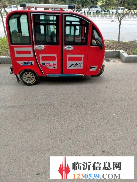 電動(dòng)三輪車。